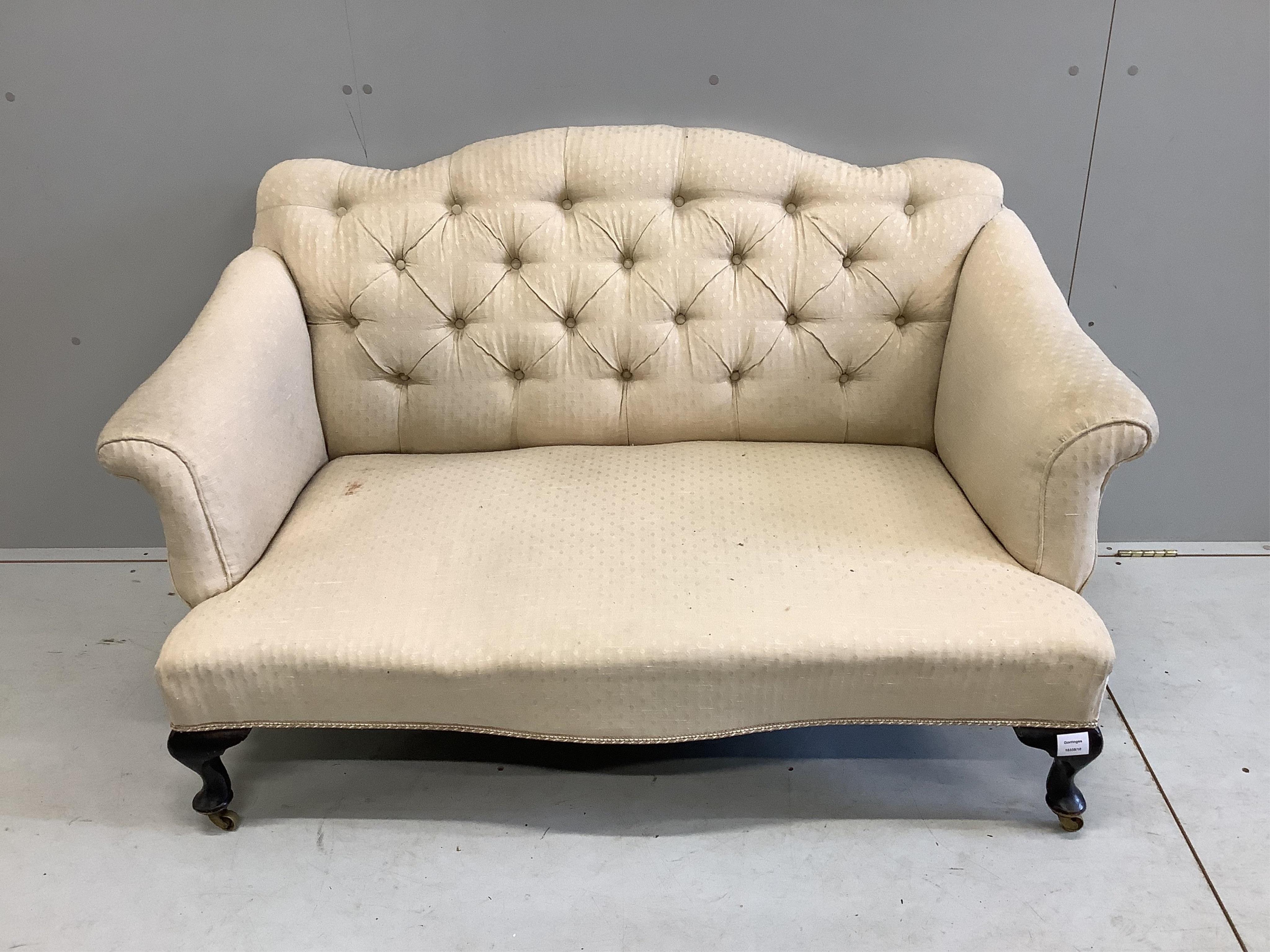 An early 20th century upholstered two seater settee, width 128cm, depth 74cm, height 82cm. Condition - fair